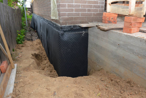 SJ Waterproofing Pros technician performing targeted Exterior Waterproofing assessment in Leo, IN